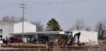 Second dump truck & backhoe/front end loader.